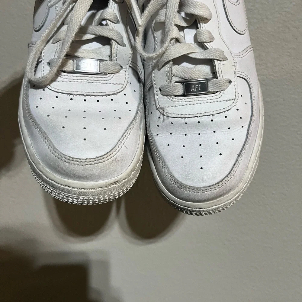 Nike Air Force 1's triple white low top youth sneakers size 6.5Y‎